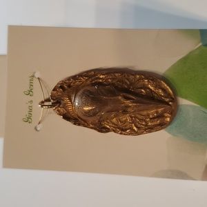 Jewelry pendant Skull Metal clay handcrafted